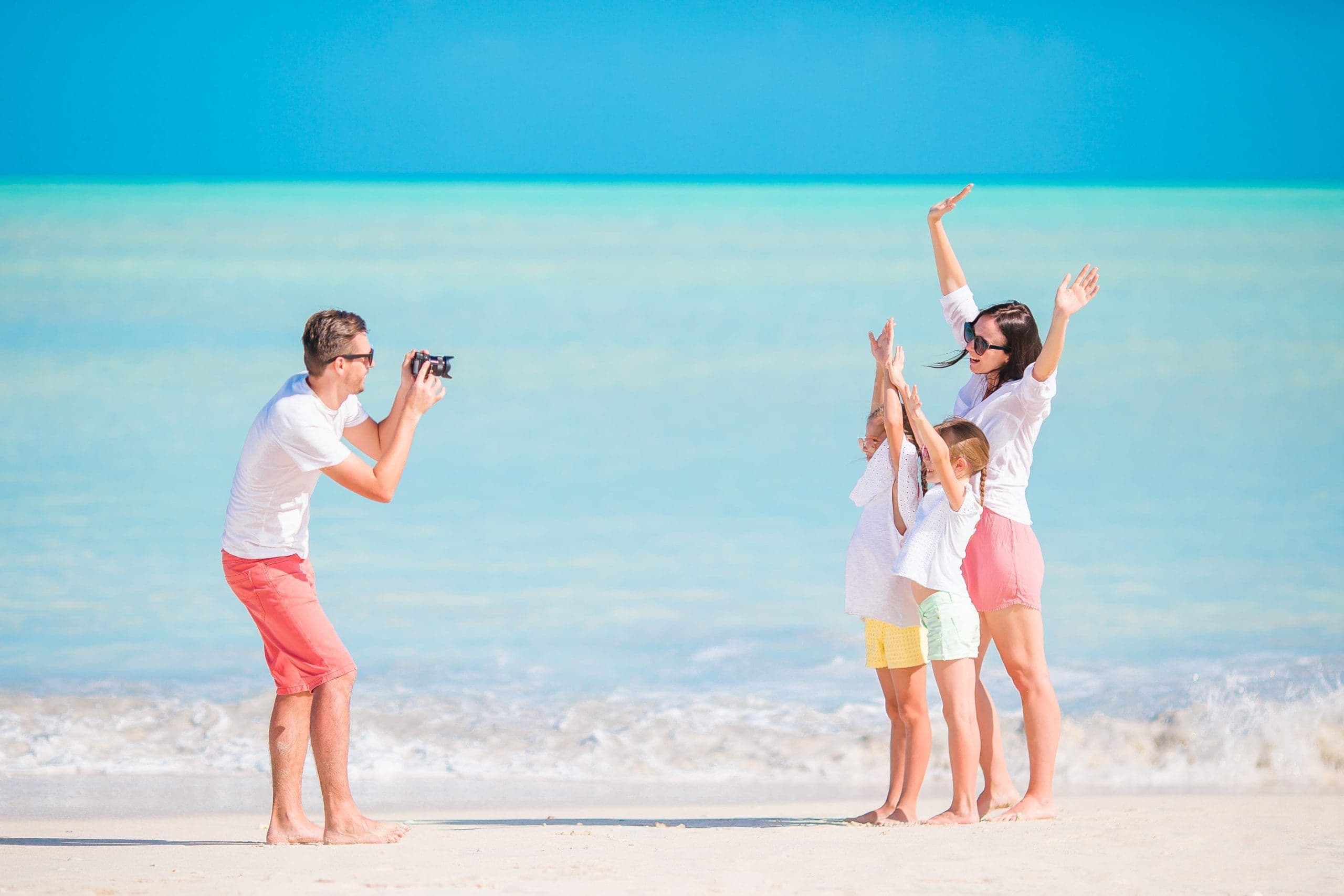 Family photographed on the Zadar waterfront at sunset